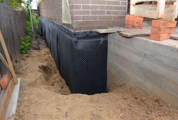Happy homeowners after waterproofing job in Odenton